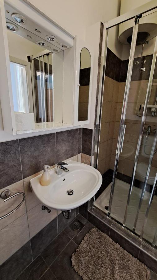 Apartmani Belsito Ловран Экстерьер фото