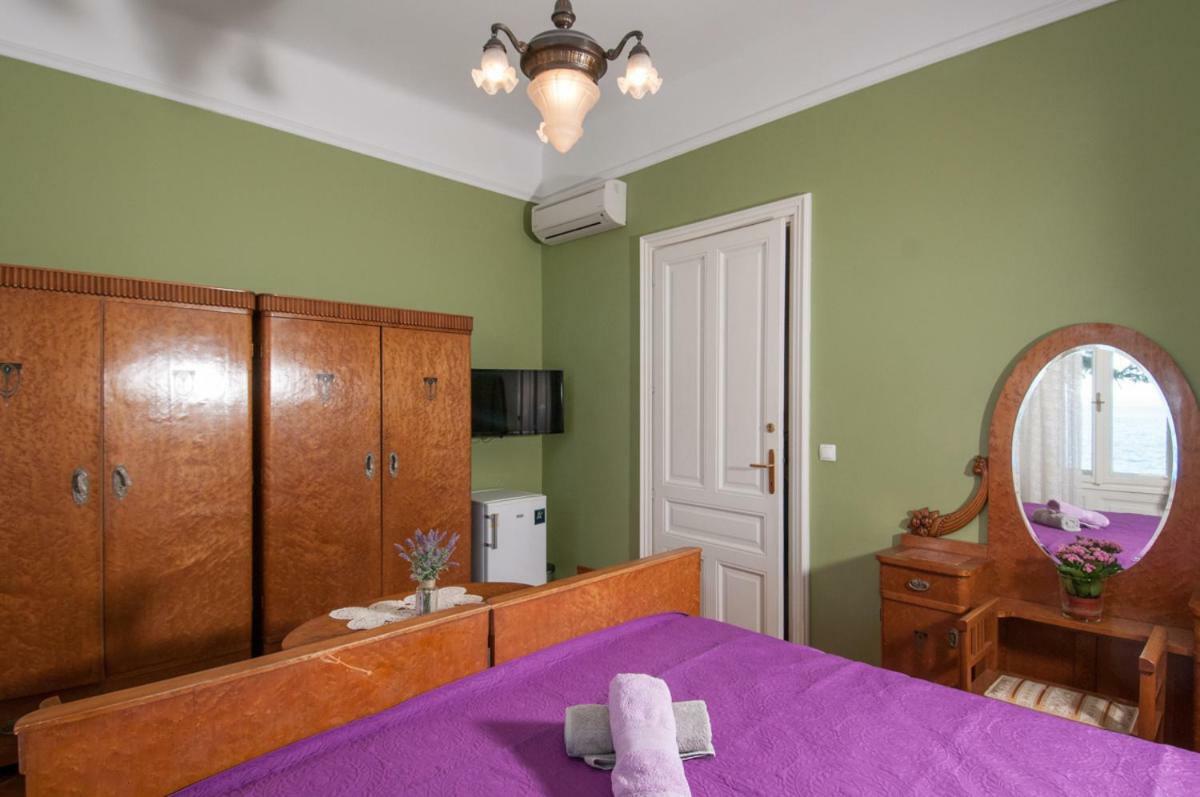 Apartmani Belsito Ловран Экстерьер фото